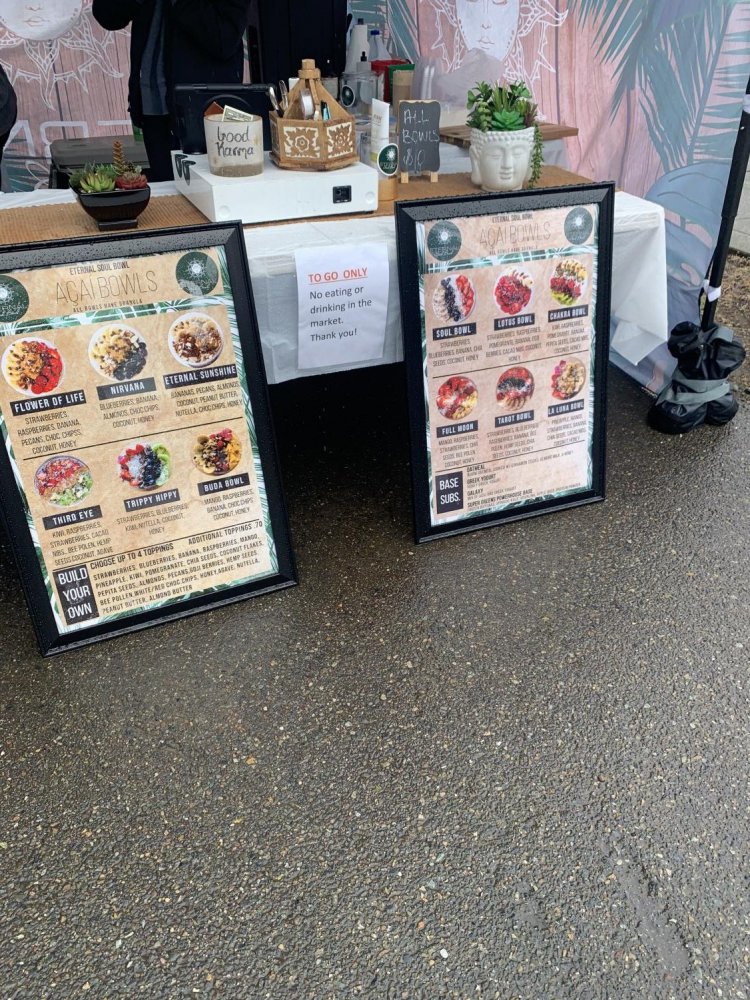 Booth selling delicious acai bowls on April 24th.  The Market moved back to Pioneer Park Pavilion around Mother\'s Day. It runs every Saturday from 9 a.m. to 2 p.m.