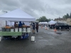 Another flower booth selling in rain or shine on April 24th. The Market moved back to Pioneer Park Pavilion around Mother's Day. It runs every Saturday from 9 a.m. to 2 p.m.