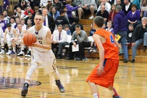 Sophomore Tyler Torgerson goes to pass the ball in their game against Graham- Kapowsin Jan. 24.