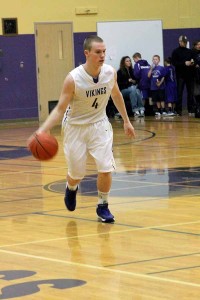 Junior Brady Winter dribbles the ball in the game against Graham- Kapowsin Jan. 24.