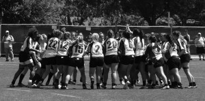 Junior Kassandra Reynolds, who sports the number 22 on the back of her jersey, heads into a huddle with her team, the Kent Crusaders, before a game.