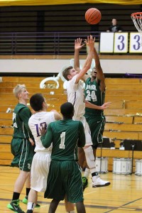 Sophomore Tony Gutierrez jumps to make a basket.