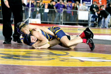 Freshman Brooklyn Bartelson controls her opponent from Kelso High School in the Washington State Wrestling Tournament Feb. 21 at the Tacoma Dome.