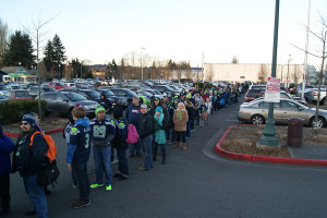 Not a short line, fans stood in brisk February weather Wednesday morning, attempting to make it up to Seattle for the Seahawk celebration parade, Feb. 5.