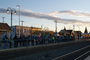 Masses of Seahawk fans gather at the Puyallup SoundTransit station early Wednesday morning wearing their blue and green. Approximately 700,000 fans gathered in Seattle for the celebratory parade to honor the Superbowl champions. Lines for tickets for the train stretched around both sides of the tracks.