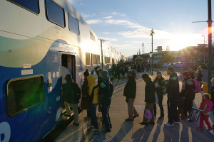 Lines of Seahawk fans board SoundTransit trains at the Puyallup train station early Wednesday morning, heading to the parade to celebrate the Seahawk Superbowl XXXXVIII, Feb. 2. 