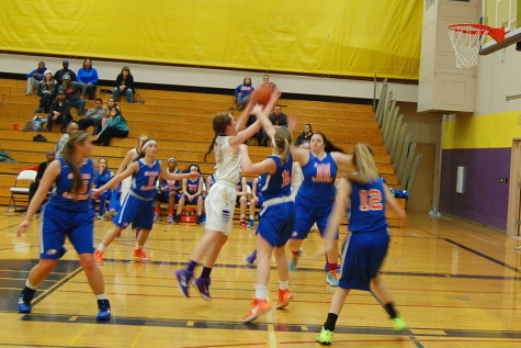 Junior Hannah DeWitt shoots the ball.