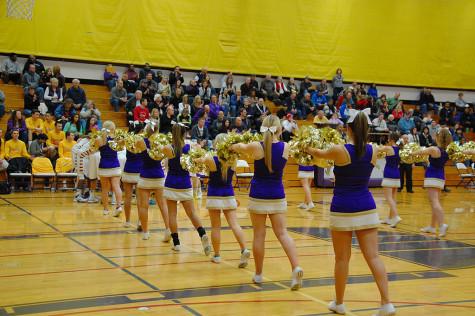 The cheerleaders line as the roster is being read. The boys basketball team lost to Curtis High School Jan. 20 with a score of 68-75 after going into overtime.