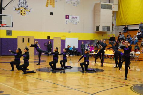 The Dance Team performs at halftime. The boys basketball team lost to Curtis High School Jan. 20 with a score of 68-75 after going into overtime.