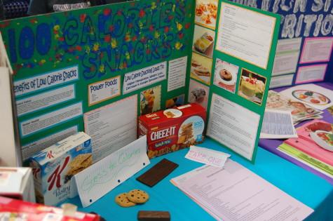 HOSA presents students with healthy snack options. The Health Occupation Students of America club held their annual spring health fair March 26.