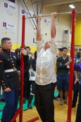 Students attempt to complete pull-ups at the marines booth. PHS held its annual Future Fair April 9 during third period. The fair presented students with a variety of colleges, universities, military representatives, employment opportunities and service organizations. 