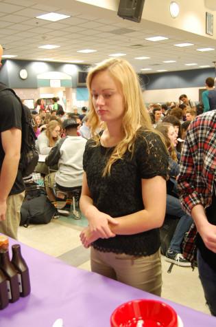 Sophomore Emily Pierson patiently waits to receive her G.P.A. sundae. Leadership rewarded students that have a G.P.A. of 3.0 or higher with ice cream sundaes during both lunches April 29. 