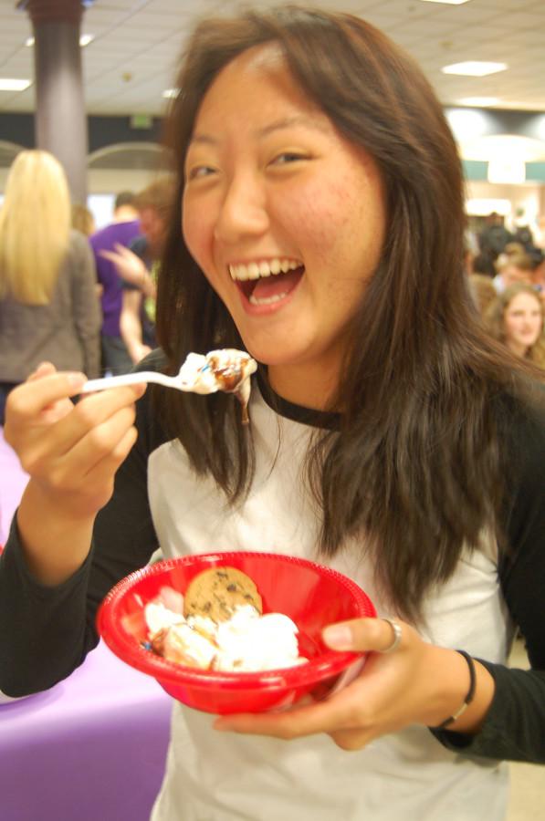 Junior Kaylee Oliva takes a bite of her free sundae. Leadership rewarded students that have a G.P.A. of 3.0 or higher with ice cream sundaes during both lunches April 29. 