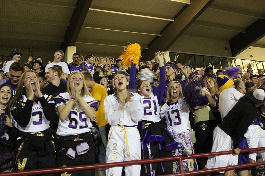 The student section cheers for the Vikings at the football game on 9/18/15.