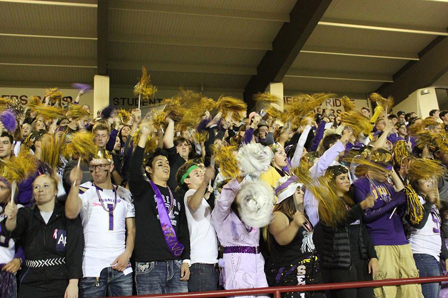 The student section goes crazy with their pompoms at the homecoming game on 10/16/15. The students show their support for their Vikings at the game.