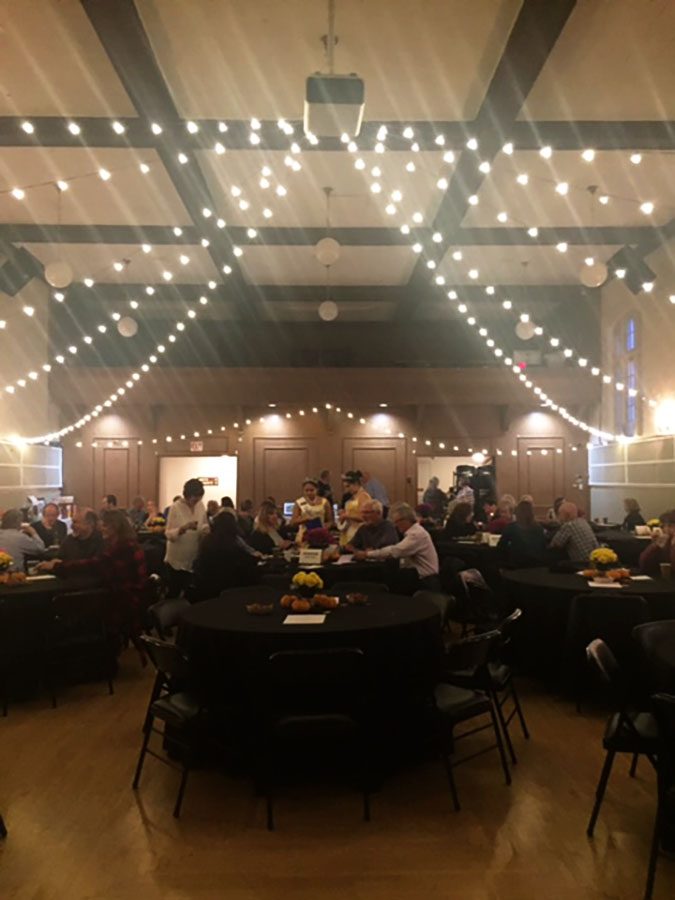 The banquet hall was decorated with string lights. Puyallup High School Alumni Association held a fundraiser night at Station House 726 in downtown Puyallup Saturday Nov. 5. The night was filled with auctions, music, dancing and dinner, all to help raise money for scholarships. 