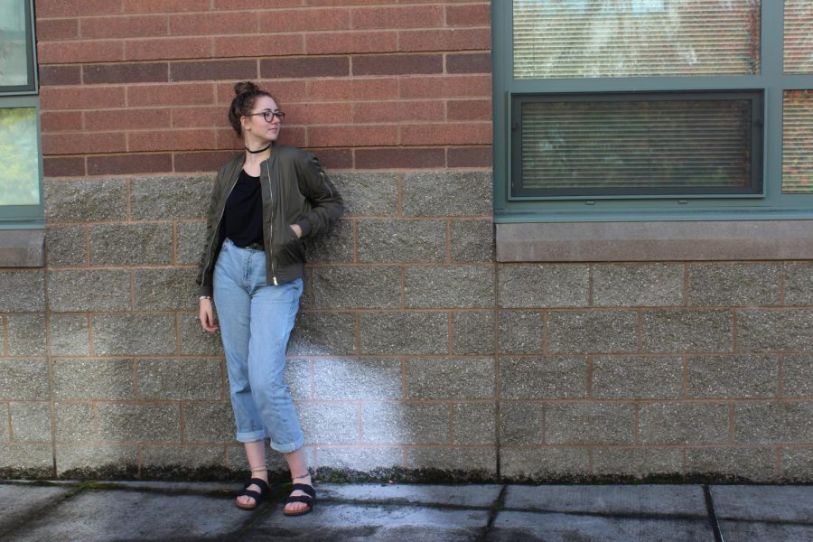 Senior, Jory Duvall, shows off her sense of style through distressed denim. I wear distressed denim, because the denim I wear rips easily and I am too cheap to buy new ones, Duvall said. Duvall also loves wearing bomber jackets and says, I wear bomber jackets, because they are cute, convenient and warm. They also match most of my clothing.