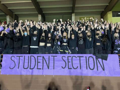 Student section cheering at PHS homecoming game.