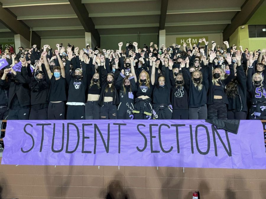 Student+section+cheering+at+PHS+homecoming+game.