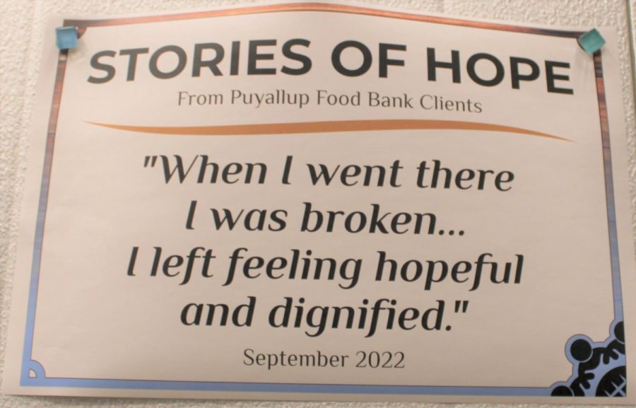 A testimony from a Puyallup Food Bank client, pictured on the Food Banks back wall. 