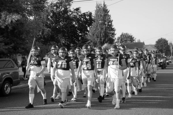 The 2023-2024 Varsity football team marches from PHS to Sparks Stadium to take the field Sept. 29 versus Rogers High School, who they beat 29-21. This 
year’s football team starts their schedule tonight at Tumwater at 7 p.m.