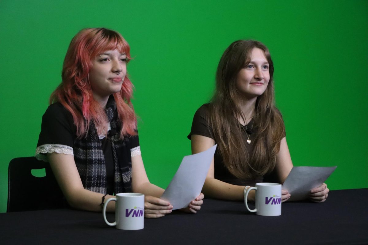 Phia Barger and Autumn Pendleton film the anchor segment Jan. 8 in the VSM studio. 
